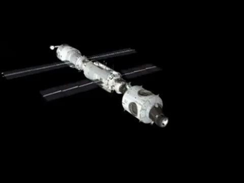 The image displays two rows of space station models against a black background. The top row shows three distinct space…