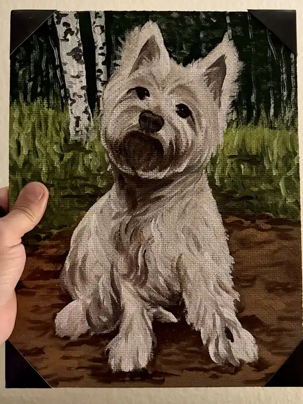 A hand holds up a textured painting of a white West Highland Terrier sitting in a forest with birch trees, with the overlaid…
