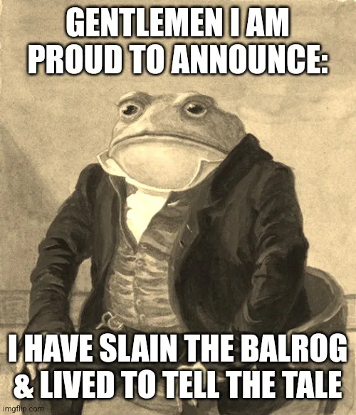 A sepia-toned image of a frog wearing a formal 18th-century style jacket and vest, seated and looking directly at the viewer…