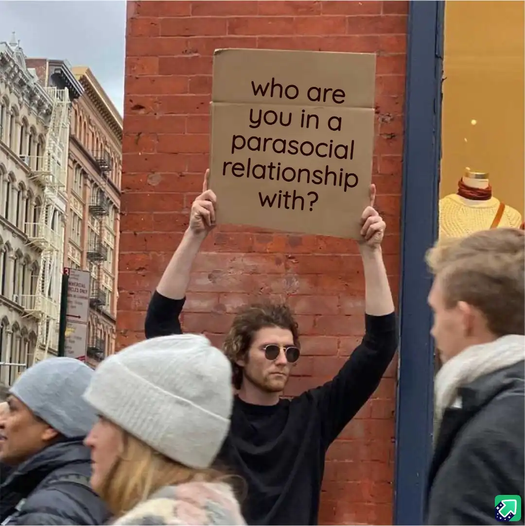A man with curly hair and sunglasses holds up a cardboard sign asking 'who are you in a parasocial relationship with?' while…