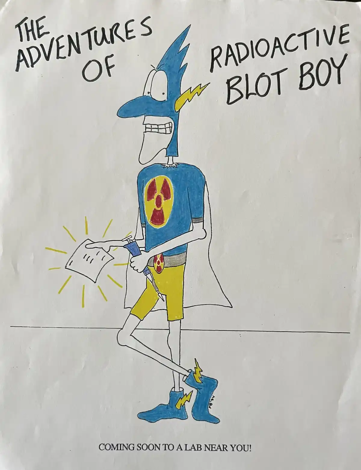 A hand-drawn comic book cover features a blue, spiky-haired superhero named 'Radioactive Blot Boy' wearing a cape, a shirt…