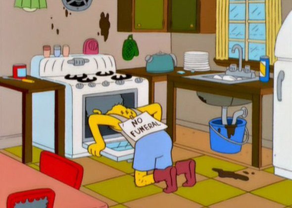 A yellow-skinned cartoon character in blue shorts and red boots kneels before an open oven in a messy kitchen, holding a…