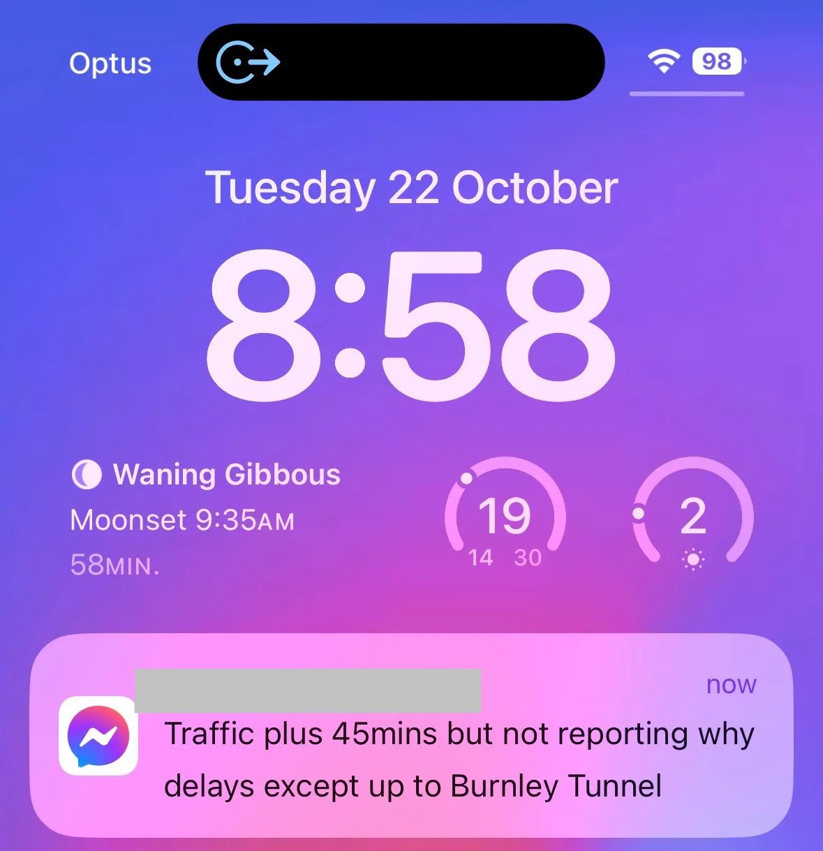 A smartphone lock screen shows the date as Tuesday 22 October and time as 8:58, with a Messenger notification at the bottom…