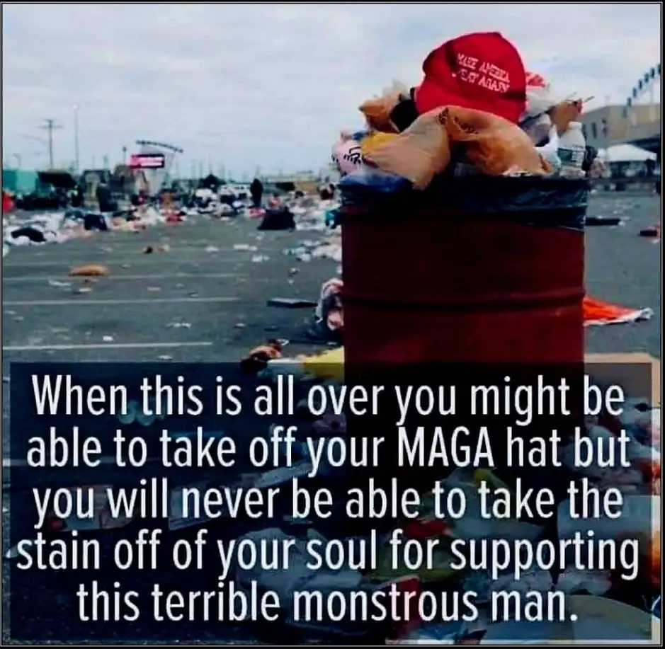 A red trash can overflowing with garbage, including a red MAGA hat, sits in a littered parking lot. A text box overlays the…