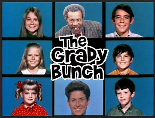 A grid of nine smiling people, including adults and children, against a blue background, with the text 'The Grady Bunch'…