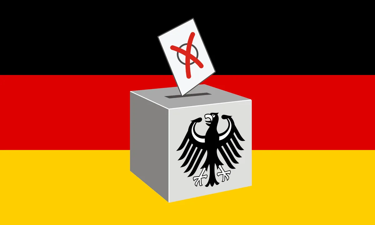 A gray ballot box featuring a black German eagle emblem sits centered against the black, red, and gold German flag. A white…