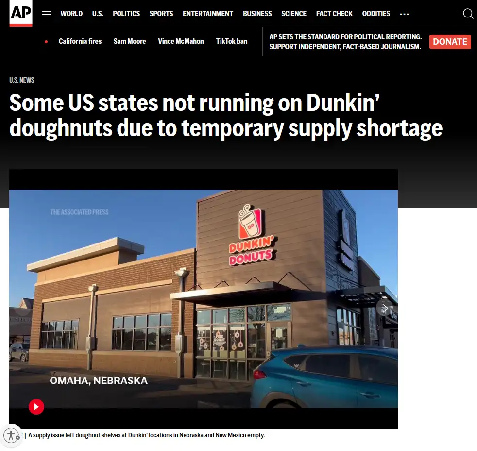 An Associated Press news article screenshot shows a Dunkin' Donuts storefront in Omaha, Nebraska, with a headline about…