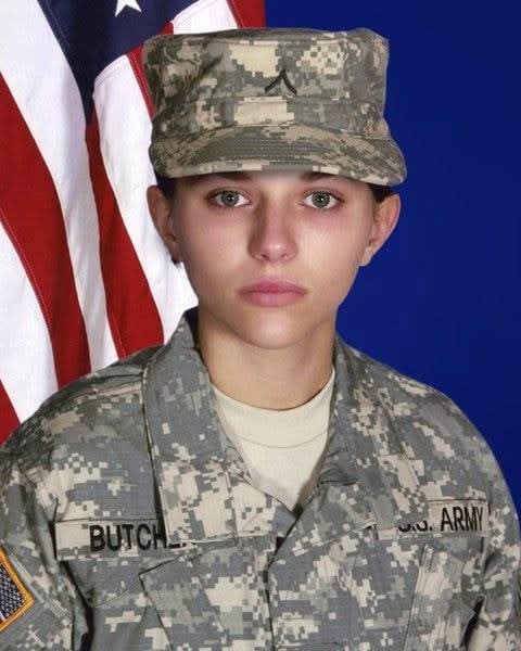 A U.S. Army soldier in camouflage uniform and cap stands in front of an American flag, with the name 'BUTCHER' overlaid on…