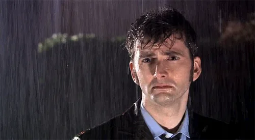 five panels show actor david tennant as the doctor standing in the rain, his expression progressively worsening from mildly…