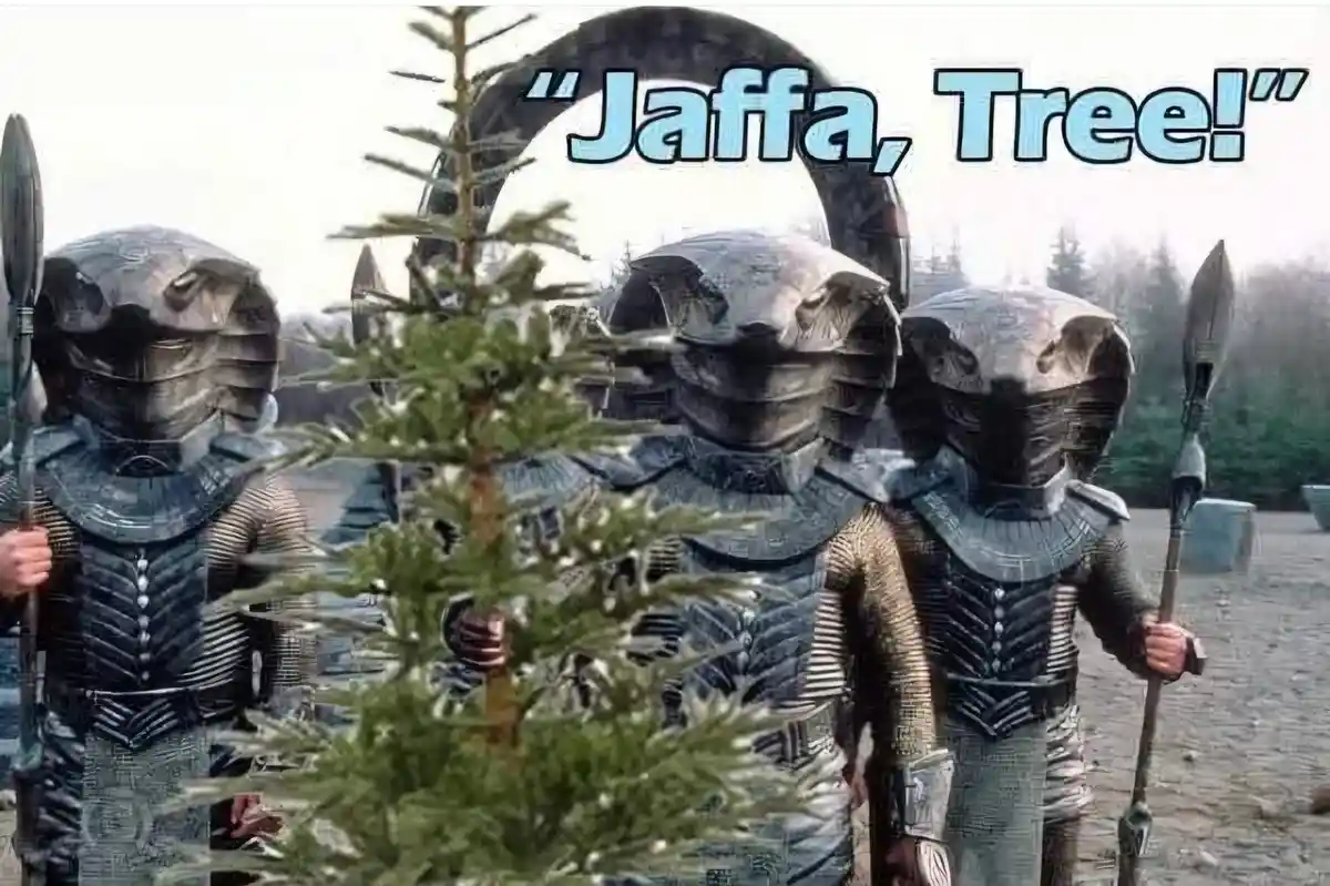 Three Jaffa warriors from Stargate SG-1, wearing their signature armor and holding staff weapons, stand in a row behind a…