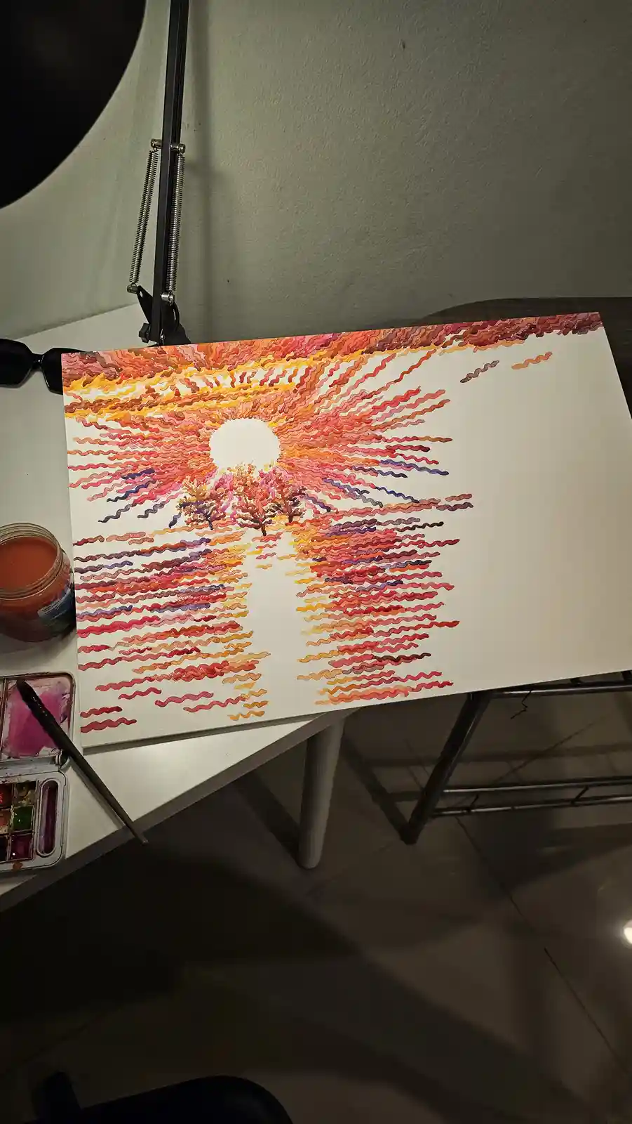 A watercolor painting of a vibrant sunset with wavy, colorful streaks radiating from a white sun disc over silhouetted…