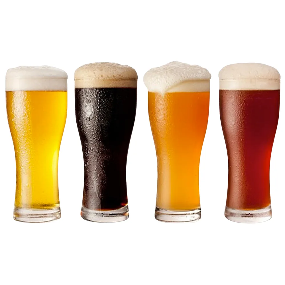 Four tall pilsner-style beer glasses are lined up side by side against a black background, each filled with a different…