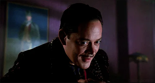 The image shows a split-screen of three frames from a movie scene featuring a man in a dark suit with a mustache, looking…