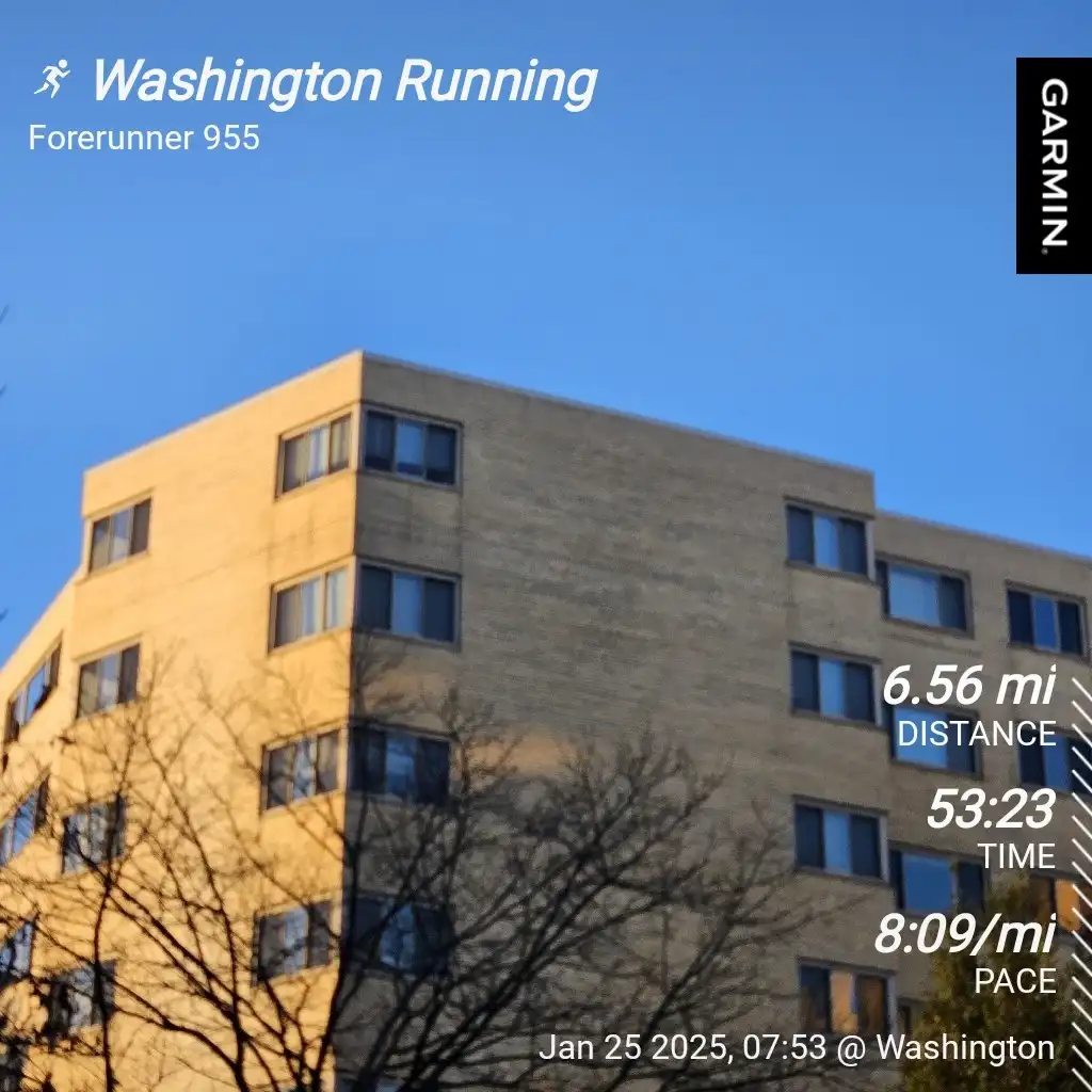 A screenshot of a Garmin Forerunner 955 running watch displaying a workout summary overlaid on a photo of a beige apartment…
