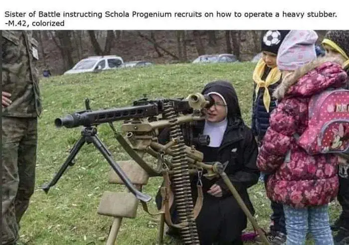 A woman in a nun's habit is kneeling and aiming a large, heavy machine gun, known as a 'stubber', while several children in…