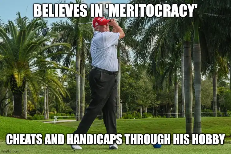 A man wearing a red cap and light blue polo shirt is mid-swing on a golf course with palm trees in the background. The image…