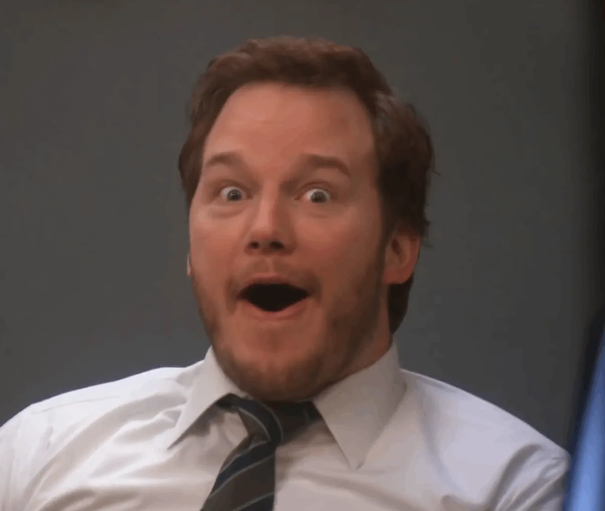 A six-panel image shows actor Chris Pratt in a white shirt and striped tie, escalating from wide-eyed shock to open-mouthed…