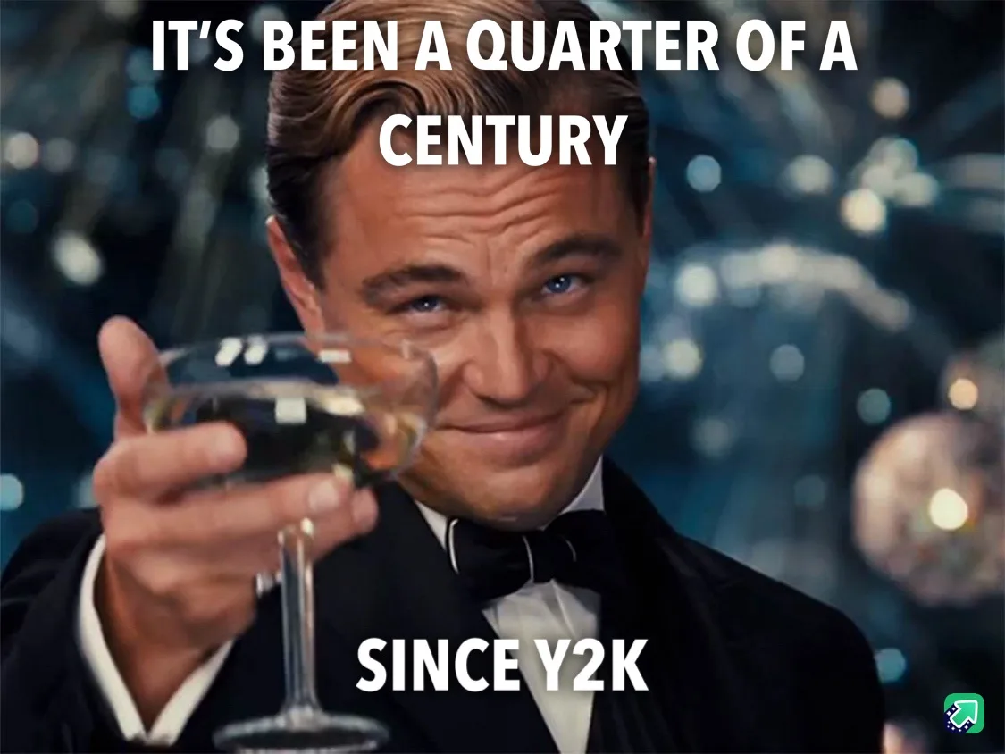 A man in a tuxedo holding a champagne glass smiles while looking at the camera. White text overlaid on the image reads 'IT'S…