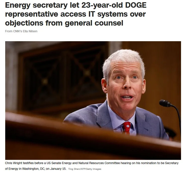 A man in a suit and red tie, identified as Chris Wright, is shown testifying at a Senate hearing with a shocked expression…