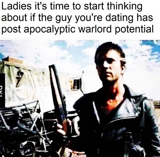 A man in a black leather jacket holds a shotgun, standing in a ruined, post-apocalyptic setting with debris and a damaged…