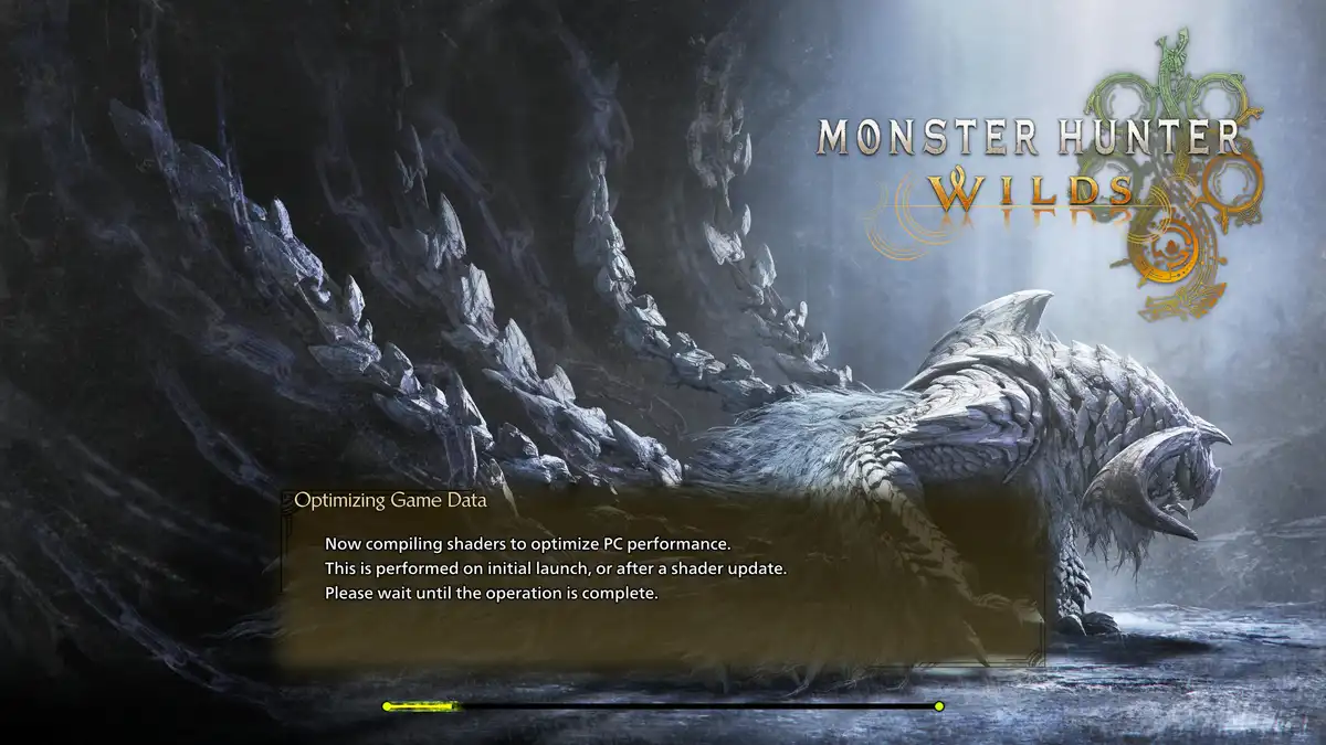 The image shows a loading screen from the game Monster Hunter Wilds, featuring a large, armored, dragon-like monster in a…