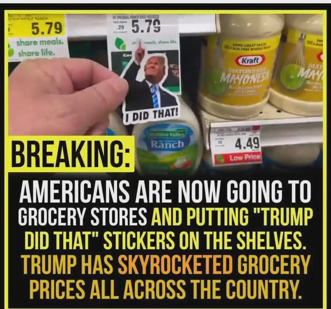 A hand holds a sticker of Donald Trump with the text 'I DID THAT!' over a bottle of Hidden Valley Ranch dressing on a…