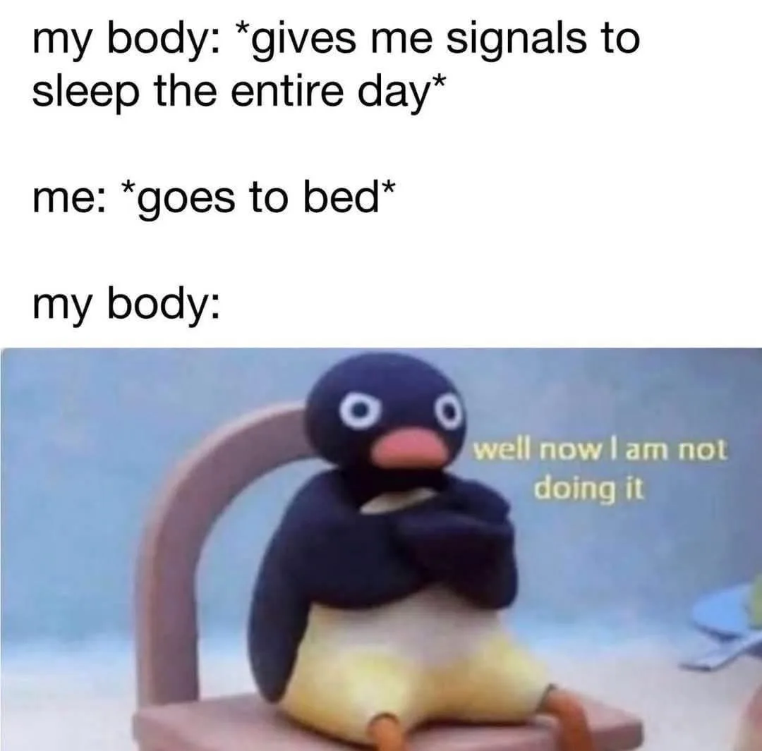 The image shows a claymation penguin character sitting on a wooden chair with arms crossed, looking annoyed. The text above…