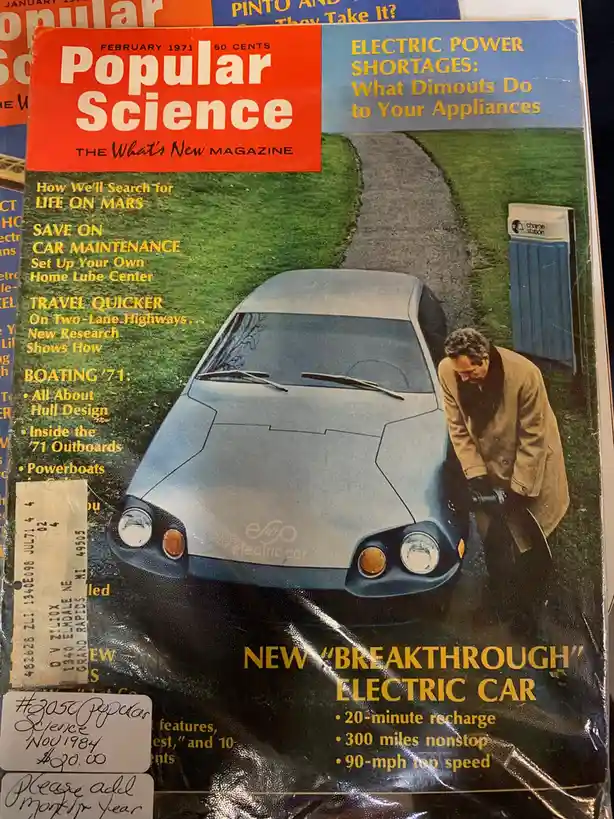 The image shows the February 1971 cover of Popular Science magazine, featuring a futuristic-looking silver electric car with…