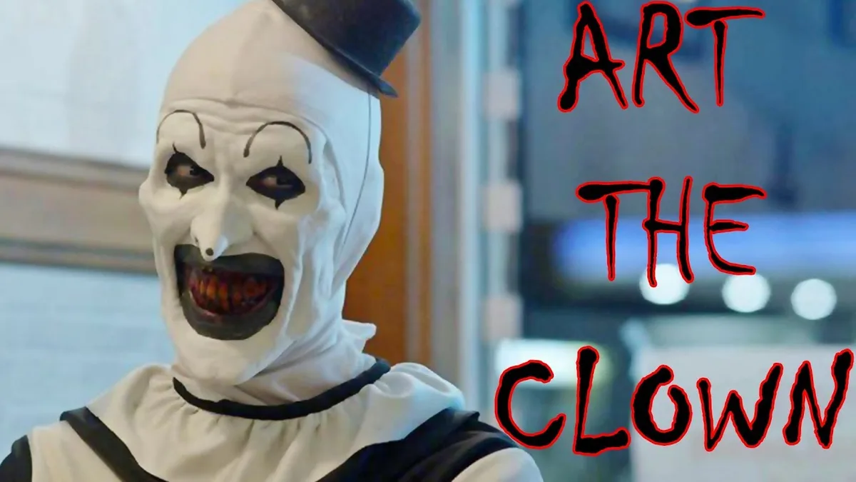 A person wearing a white, stretched clown mask with exaggerated black eyes, a wide grin revealing sharp teeth, and a small…