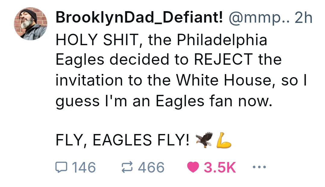A screenshot of a tweet from user BrooklynDad_Defiant! shows a tweet expressing excitement over the Philadelphia Eagles…