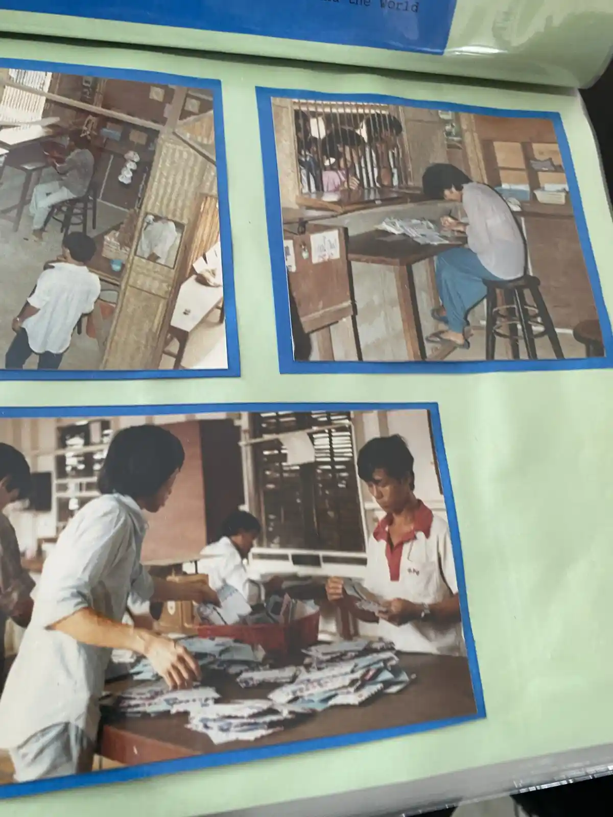 Three vintage photos show people in what appears to be a mailroom or post office, sorting and handling mail. The top-left…