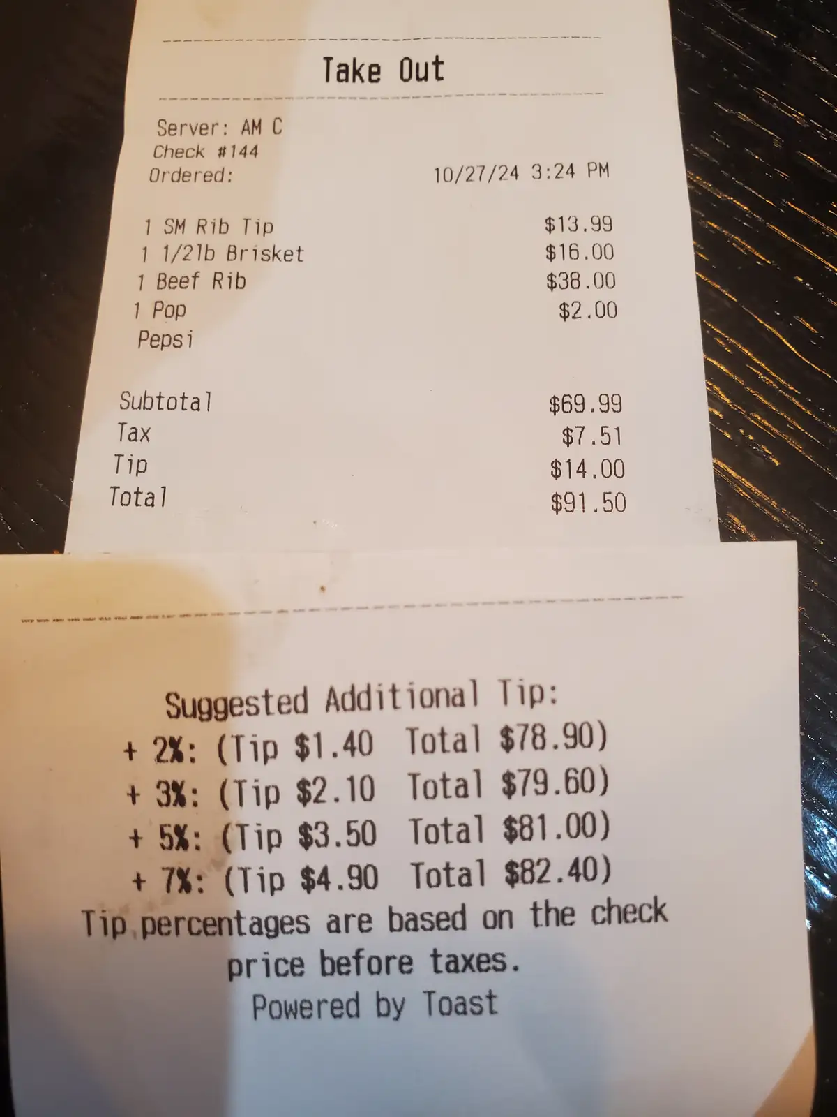 A restaurant takeout receipt from October 27, 2024, showing a subtotal of $69.99, tax of $7.51, and a tip of $14.00…