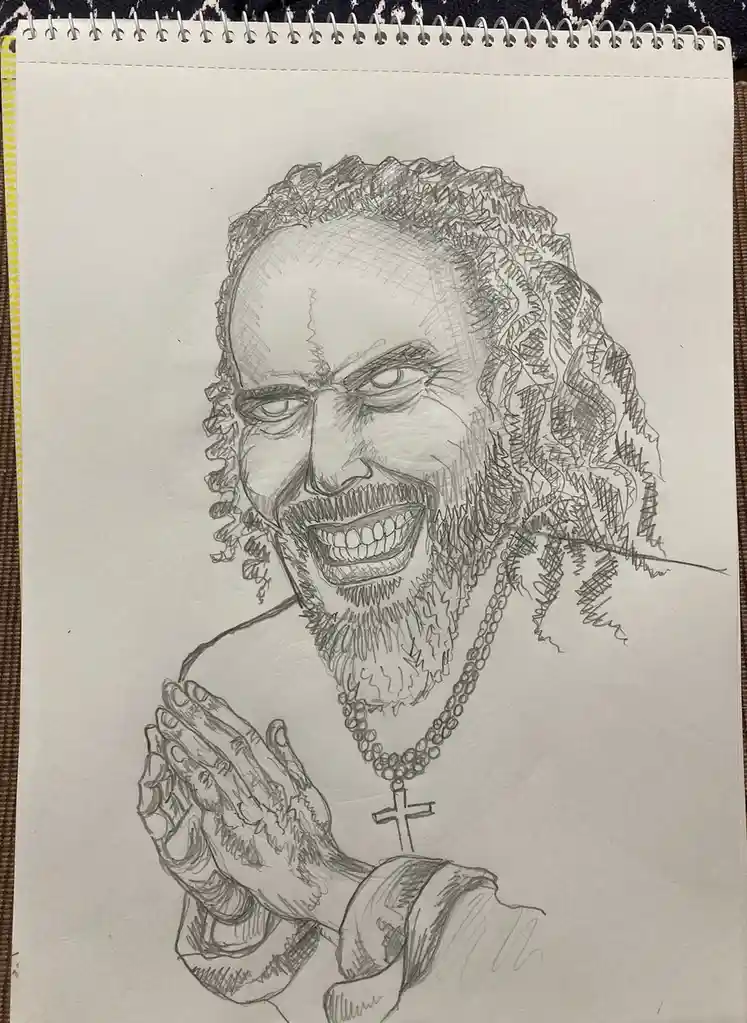 A pencil sketch on spiral-bound paper depicts a caricature of Jesus with wild curly hair, a beard, and a wide, toothy grin…