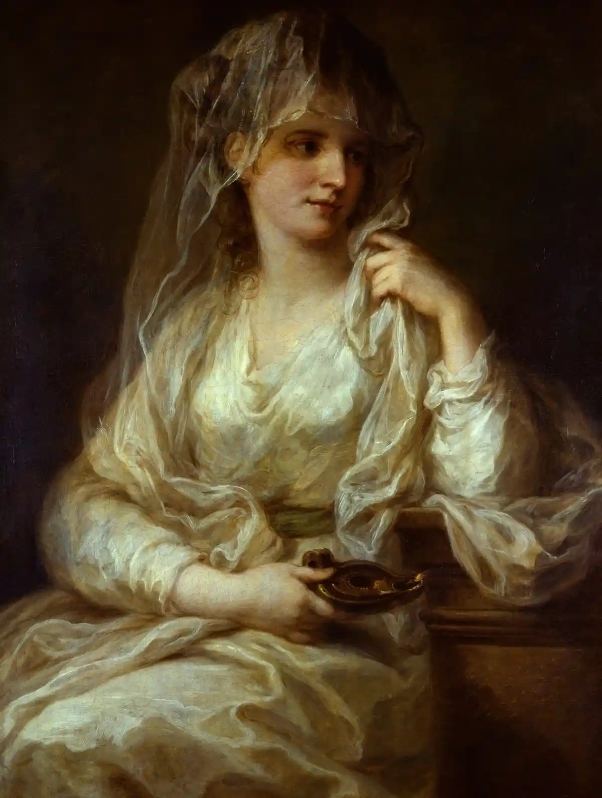 A classical painting of a woman in a white gown and veil holding a small oil lamp, looking pensively to the side. The…