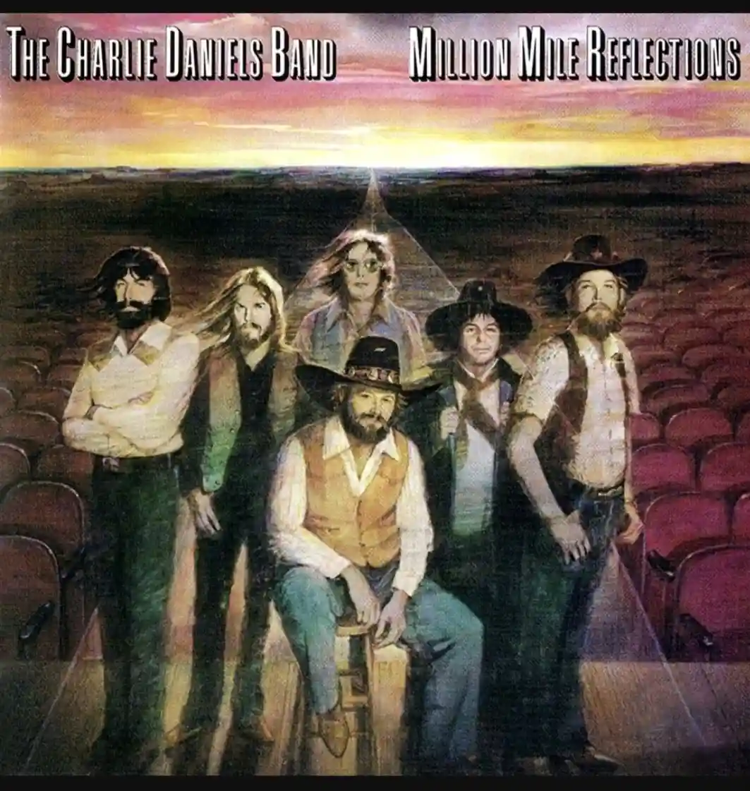 The album cover for 'Million Mile Reflections' by The Charlie Daniels Band shows six men in western-style clothing posing in…
