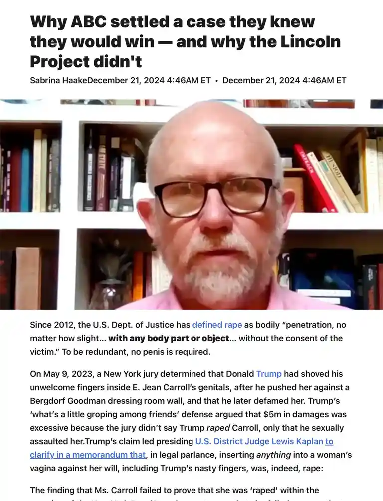 A screenshot of a news article featuring a bald man with glasses and a pink shirt, sitting in front of bookshelves. The…