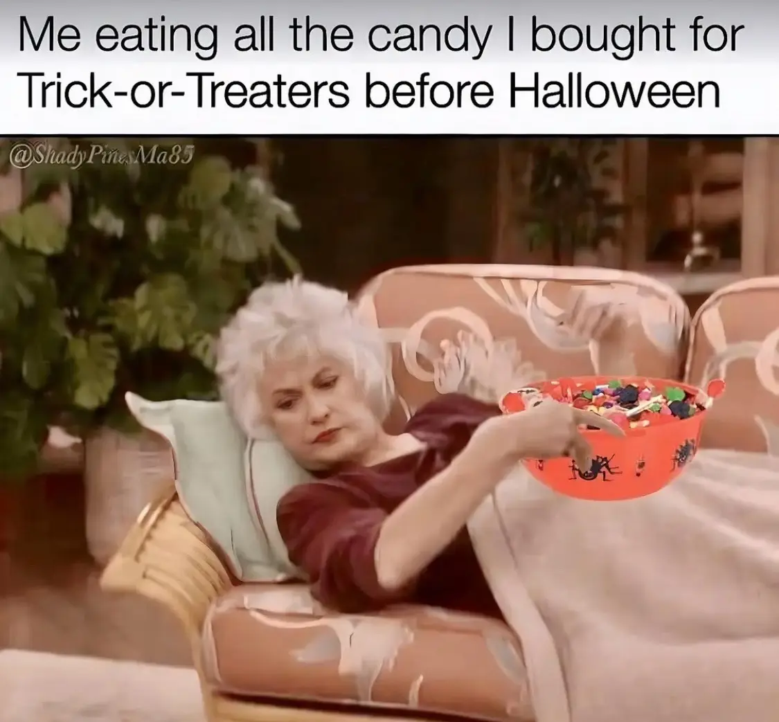 An older woman with white hair sits on a couch, looking guilty while holding a bowl of Halloween candy. The overlaid text…