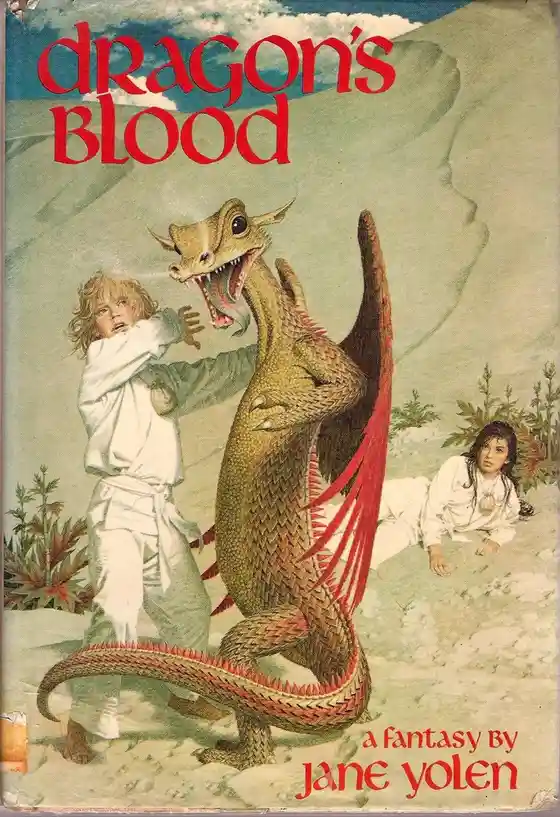 The image is a vintage book cover for 'Dragon's Blood' by Jane Yolen, depicting a large, scaly dragon with red-tipped wings…