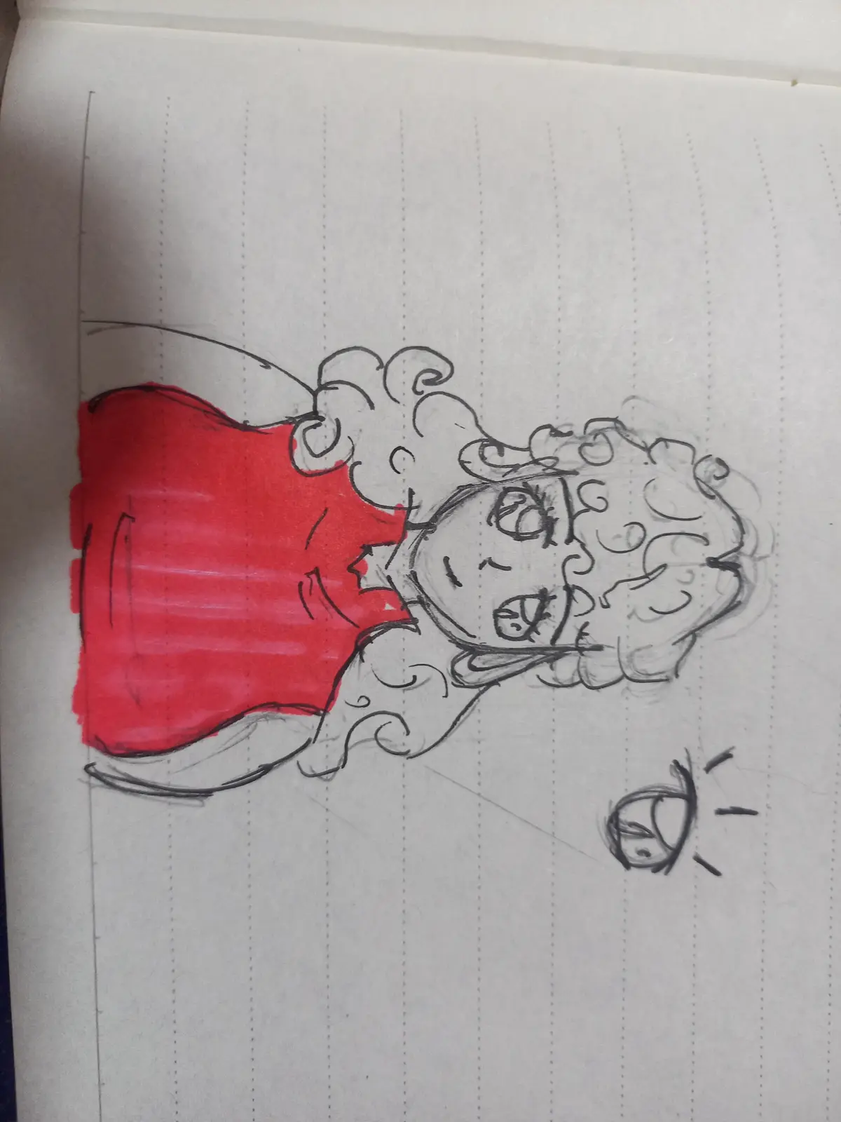 A hand-drawn sketch on lined paper shows a cartoonish character with curly hair, wearing a red shirt, looking distressed…