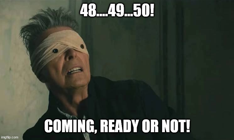 A man with a white bandage over his eyes, looking upward with an intense expression, is overlaid with the text…