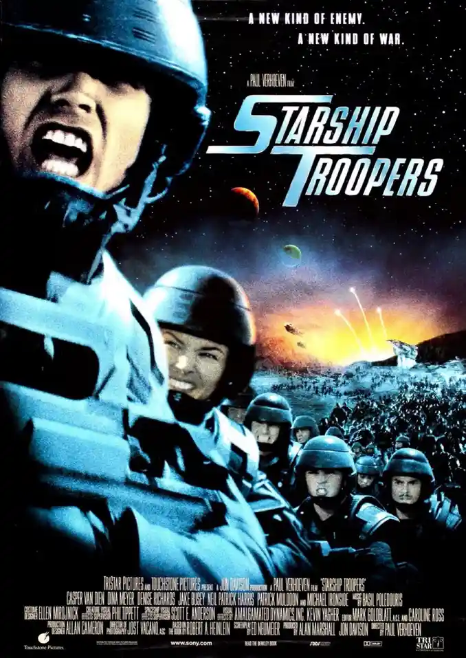 The image is the movie poster for 'Starship Troopers,' showing soldiers in futuristic armor with helmets, one screaming in…