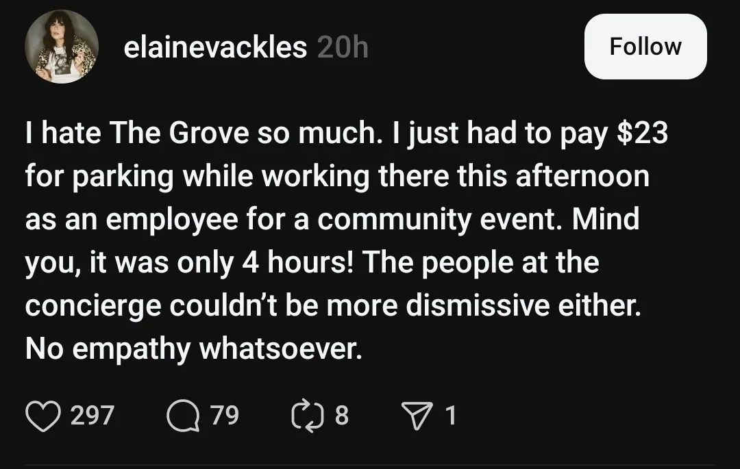 A screenshot of a social media post by user 'elainevackles' complaining about paying $23 for parking while working at The…