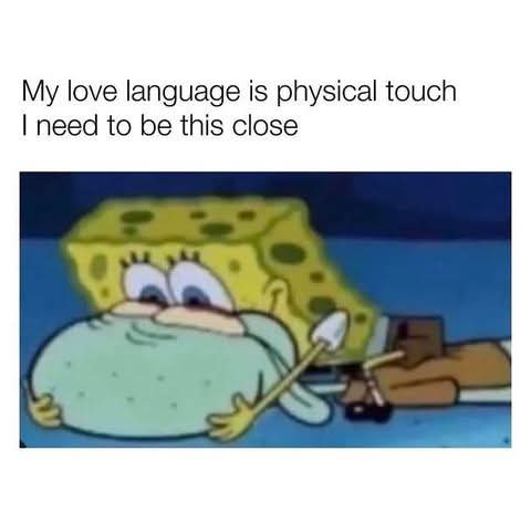 SpongeBob SquarePants is shown lying on his back, hugging a large, round, light-blue object with both arms while looking up…