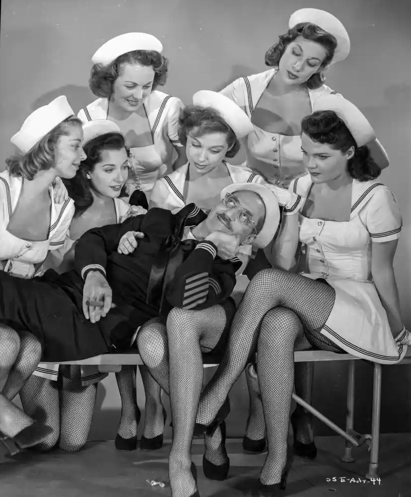 Promotional poster for 'A Girl in Every Port' (1952) featuring the iconic Groucho Marx.
