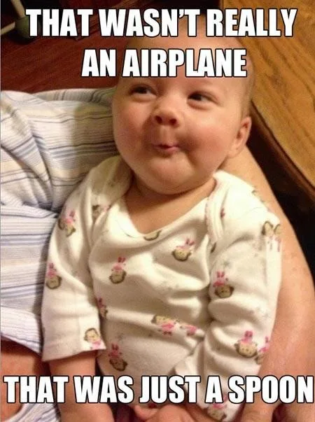 A baby in a white onesie with cartoon monkey prints is being held, looking upward with a smug, knowing expression. The text…
