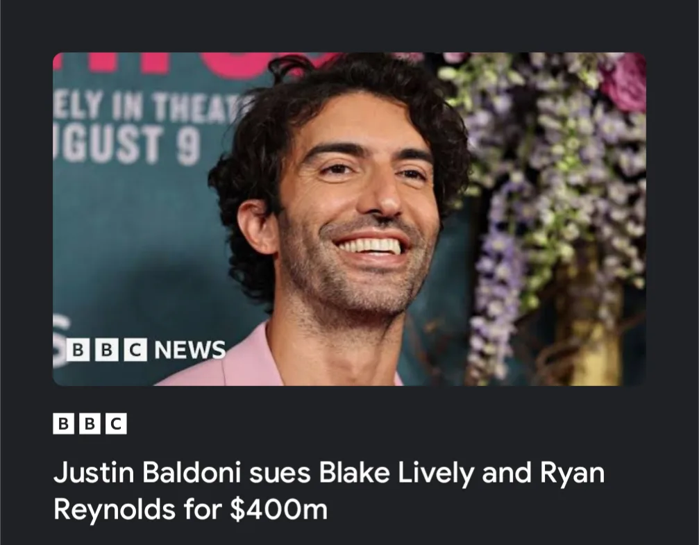 A smiling man with dark curly hair and a pink shirt appears in a BBC News screenshot, overlaid with the headline 'Justin…