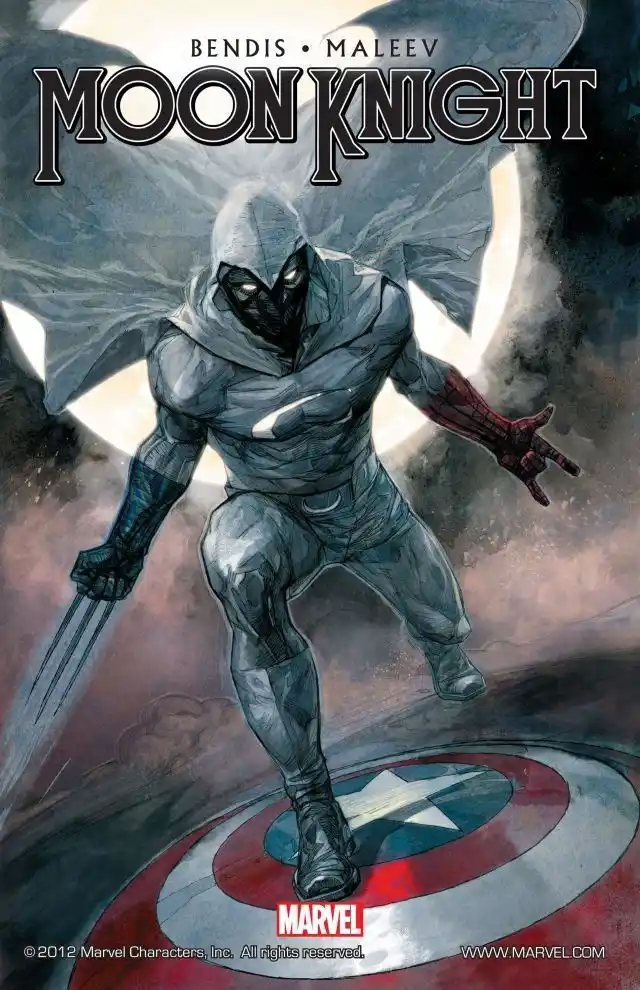 A comic book cover of Moon Knight standing on Captain America's shield, holding a blade and making a hand gesture, with the…