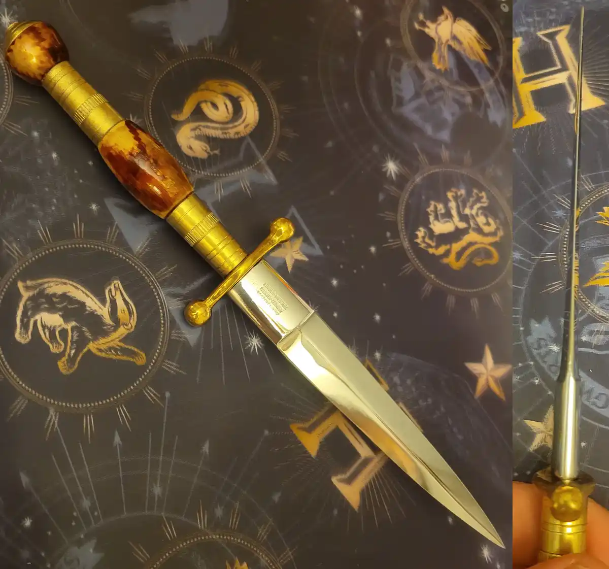 a dagger with a golden hilt and a shiny blade is displayed on a surface featuring the four harry potter house crests…