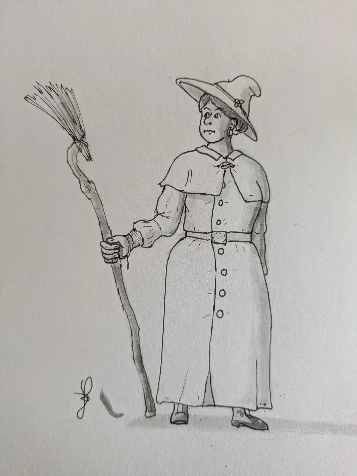 A black-and-white sketch depicts a woman in a pointed witch's hat and long dress, holding a broomstick. She has a slightly…