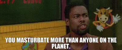A still image of comedian Chris Rock in a classroom setting, looking shocked and incredulous, with a cartoon cow mascot…